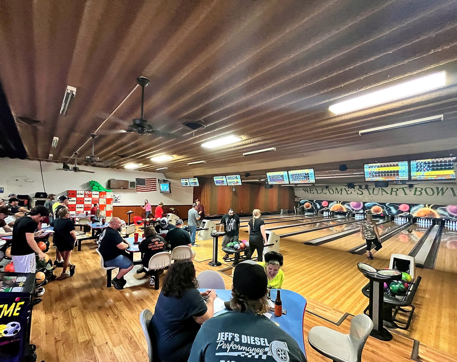 Inside Stuart Bowl on a busy night, lanes and concourse full of bowlers